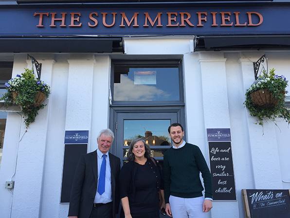 Joe Courtney and family outside The Summerfield